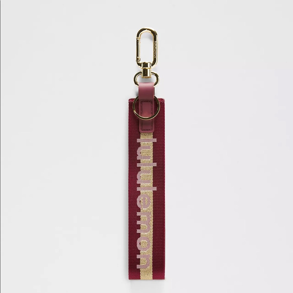 Lululemon Never Lost Keychain Deep Luxe/Gold/Bone